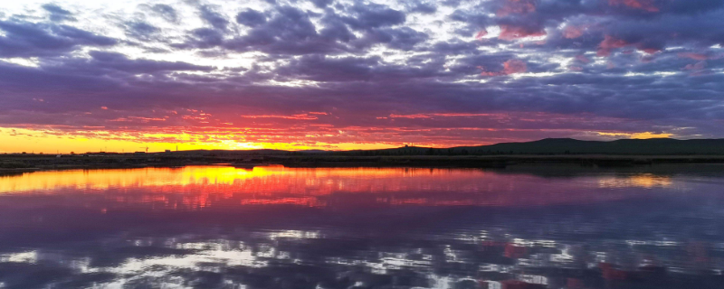 呼伦湖枯水期时水美如镜的原因 说明呼伦湖面积季节变化非常大的自然原因