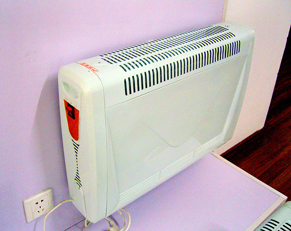 壁挂式电暖器优点 室内高温收到欢迎