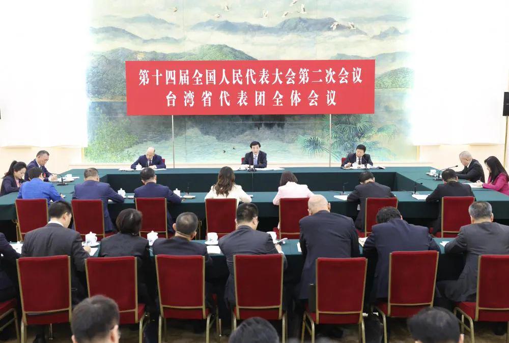 王沪宁参加审议、台湾代表团开放团组，都释放了这一信号